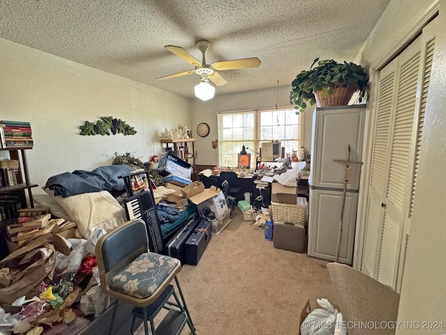 613 S Rodgers St, Vian, OK 74962 - carpeted bedroom featuring a closet, ceiling fan, and a textured ceiling