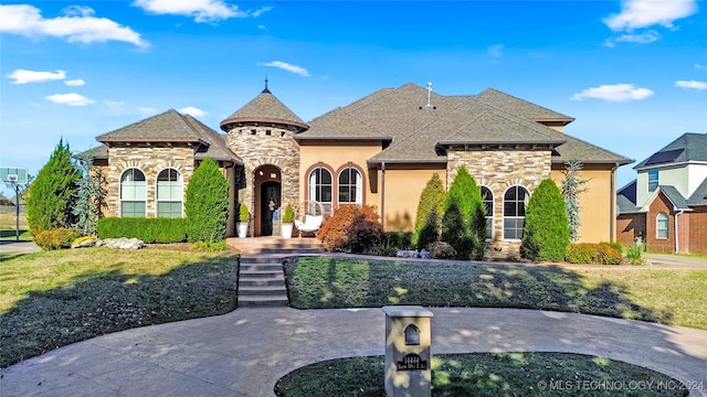 view of french country style house