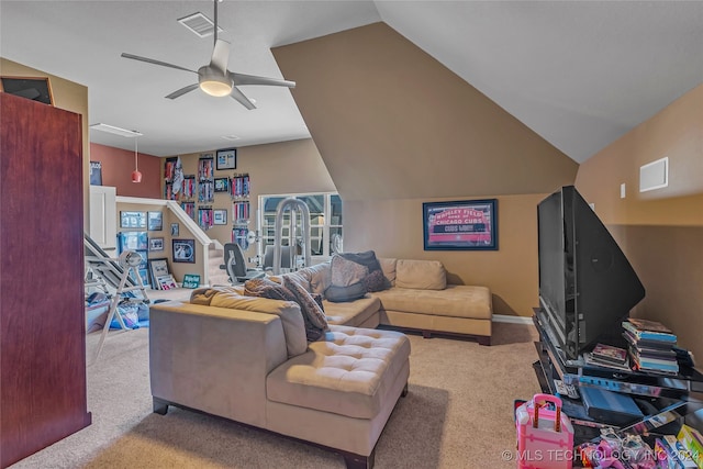 carpeted living room featuring ceiling fan and lofted ceiling