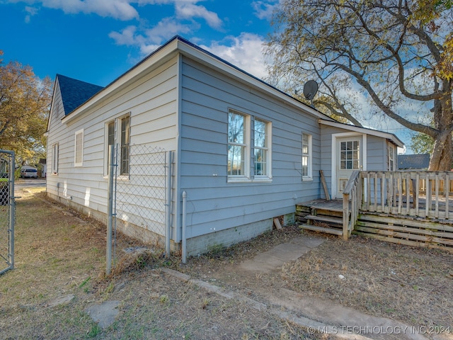 view of front of property with a deck