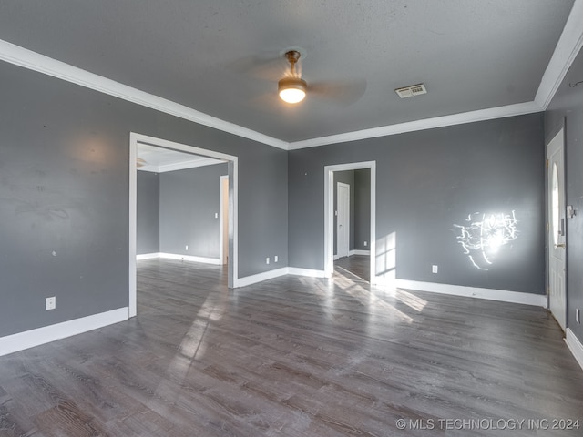 empty room with hardwood / wood-style floors, a textured ceiling, ceiling fan, and ornamental molding