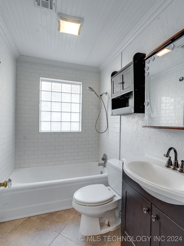 full bathroom with vanity, tile patterned floors, crown molding, tiled shower / bath combo, and toilet