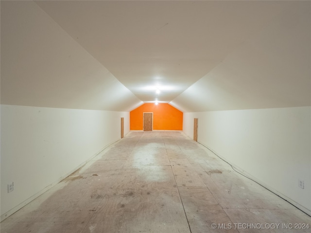 bonus room featuring vaulted ceiling