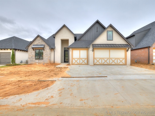 view of front of home featuring a garage