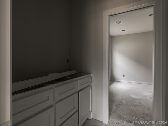 bathroom with concrete floors