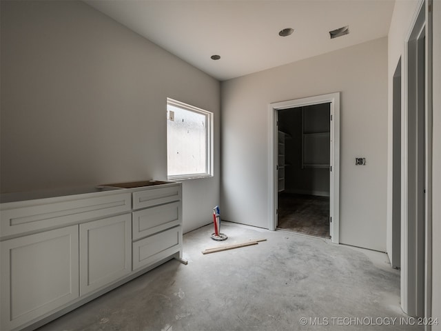 interior space featuring a walk in closet