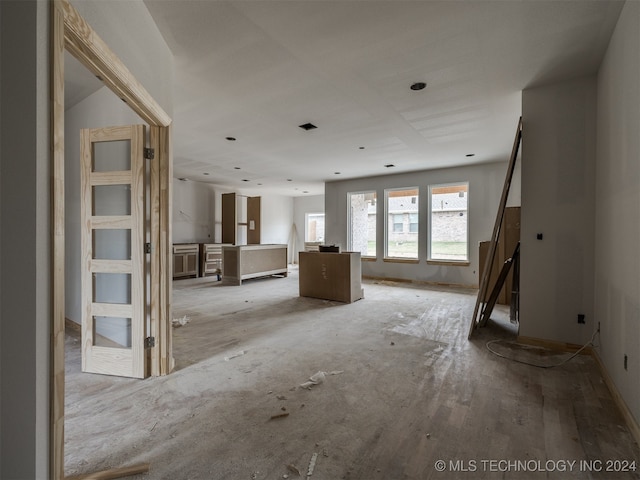 unfurnished living room with light hardwood / wood-style flooring