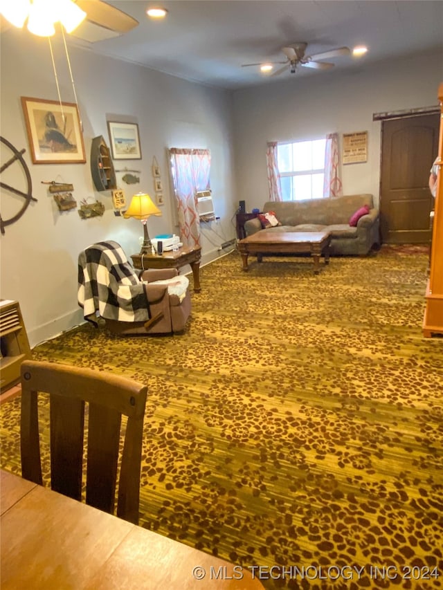 living room featuring ceiling fan