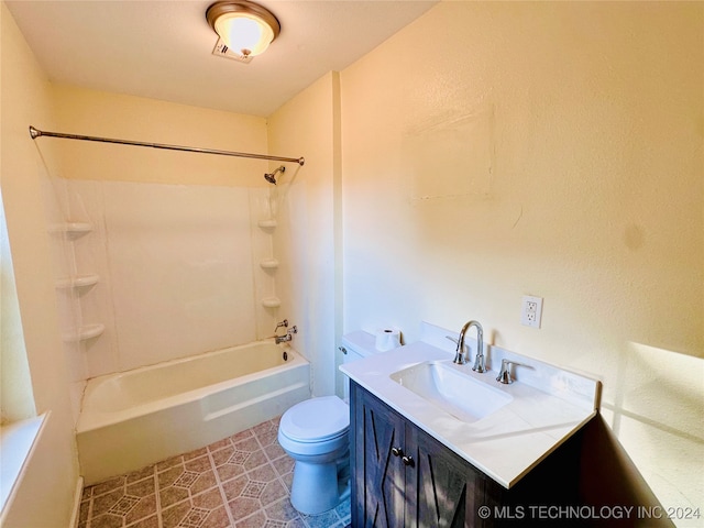 full bathroom featuring tile patterned flooring, vanity, toilet, and shower / bath combination