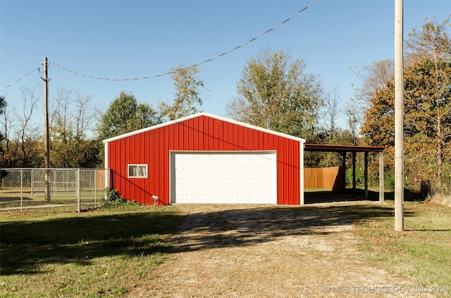 garage with a yard