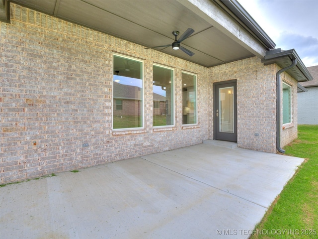 view of patio with ceiling fan