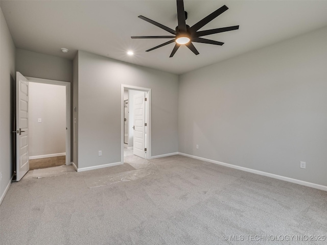 unfurnished bedroom with recessed lighting, ensuite bath, baseboards, and light carpet