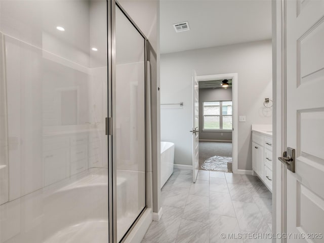 bathroom featuring a shower stall, marble finish floor, vanity, and visible vents