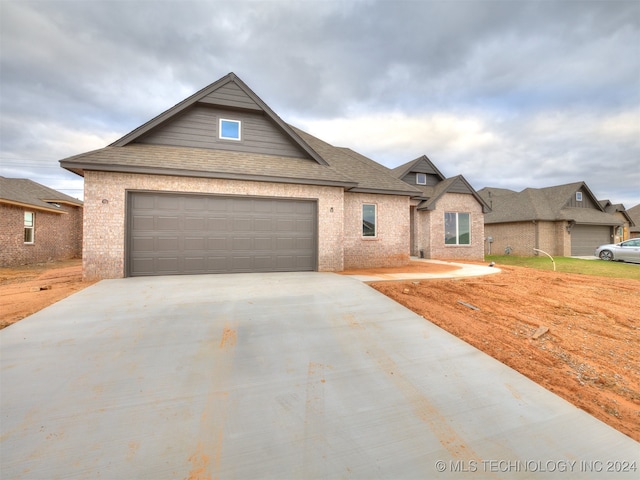 view of front of property featuring a garage