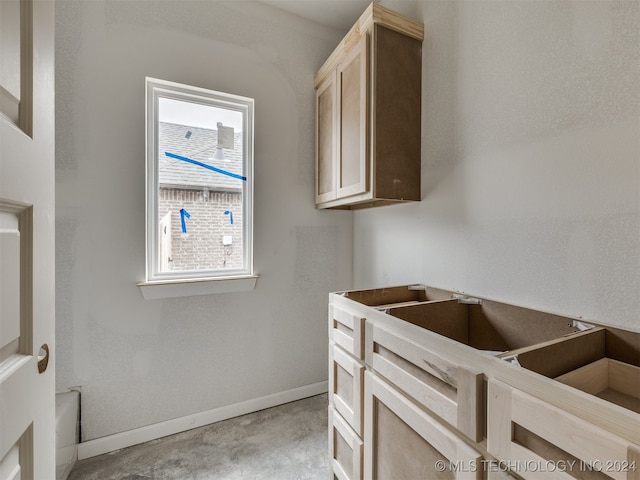 laundry room with a wealth of natural light