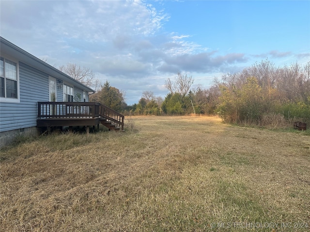 view of yard with a deck