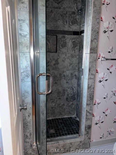 bathroom featuring walk in shower