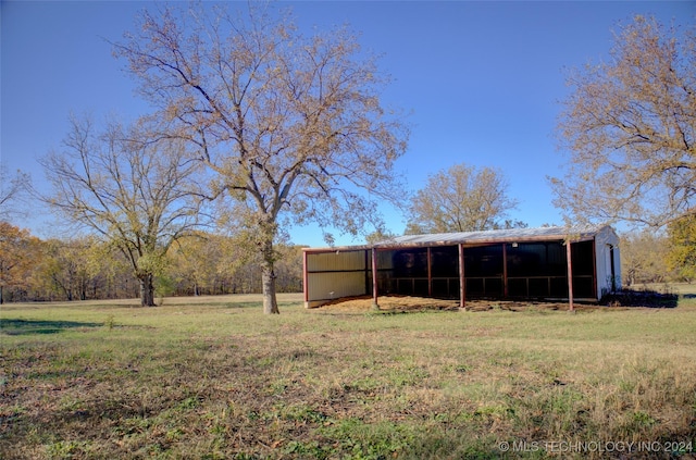 17808 S 129th E Ave, Bixby, OK 74008 - view of grassy yard featuring a pole building and an outdoor structure