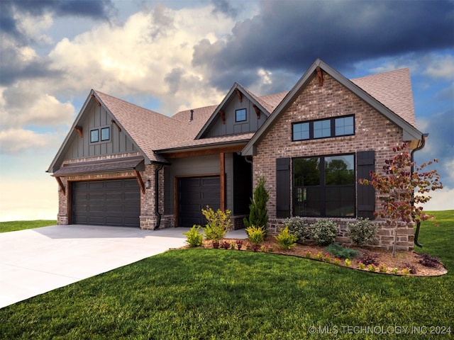 craftsman house featuring a garage and a yard