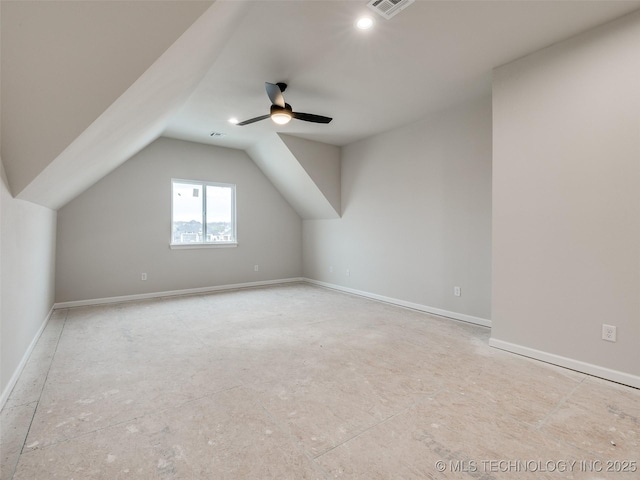 bonus room with ceiling fan and vaulted ceiling