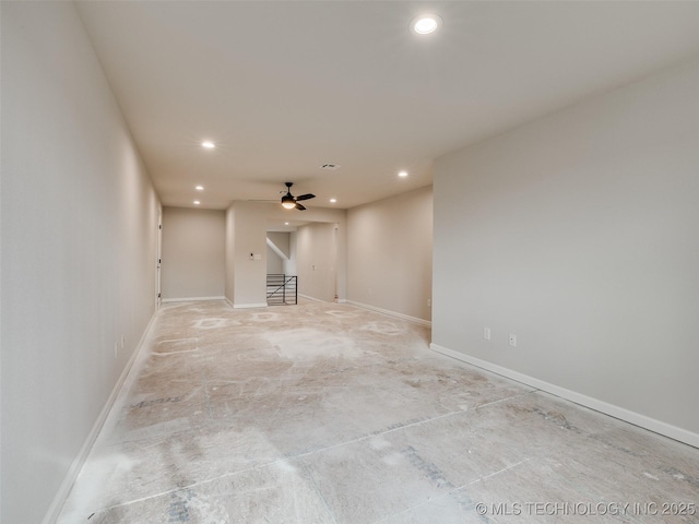 unfurnished living room with ceiling fan