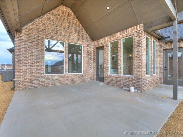 view of patio / terrace with central AC unit