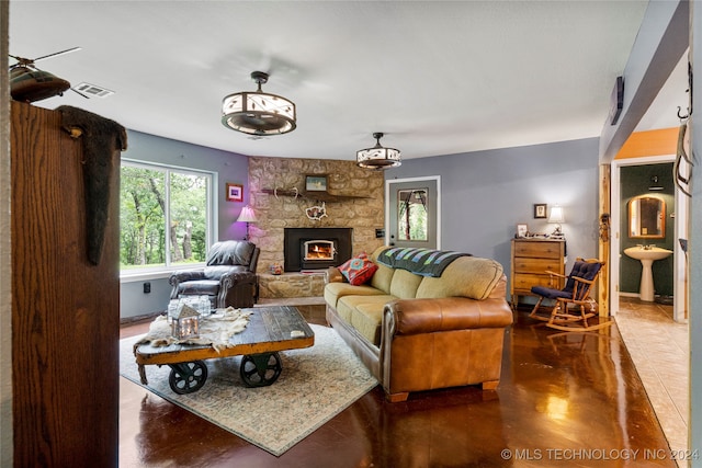 living room featuring a fireplace