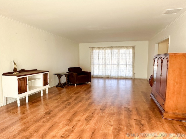 sitting room featuring hardwood / wood-style floors