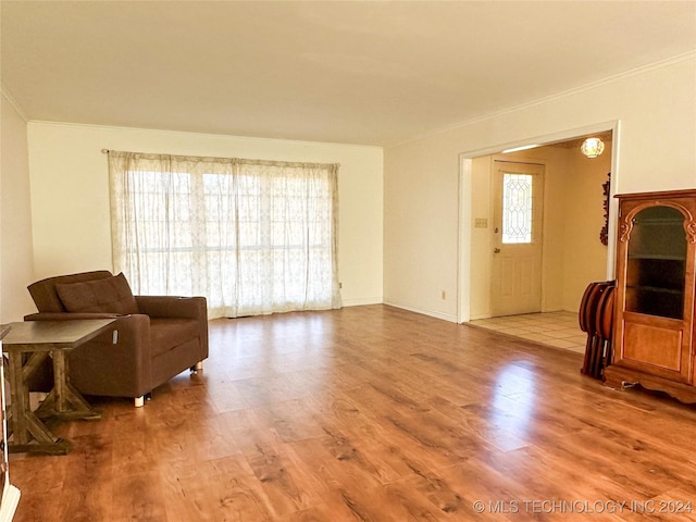 living room with plenty of natural light and wood-type flooring