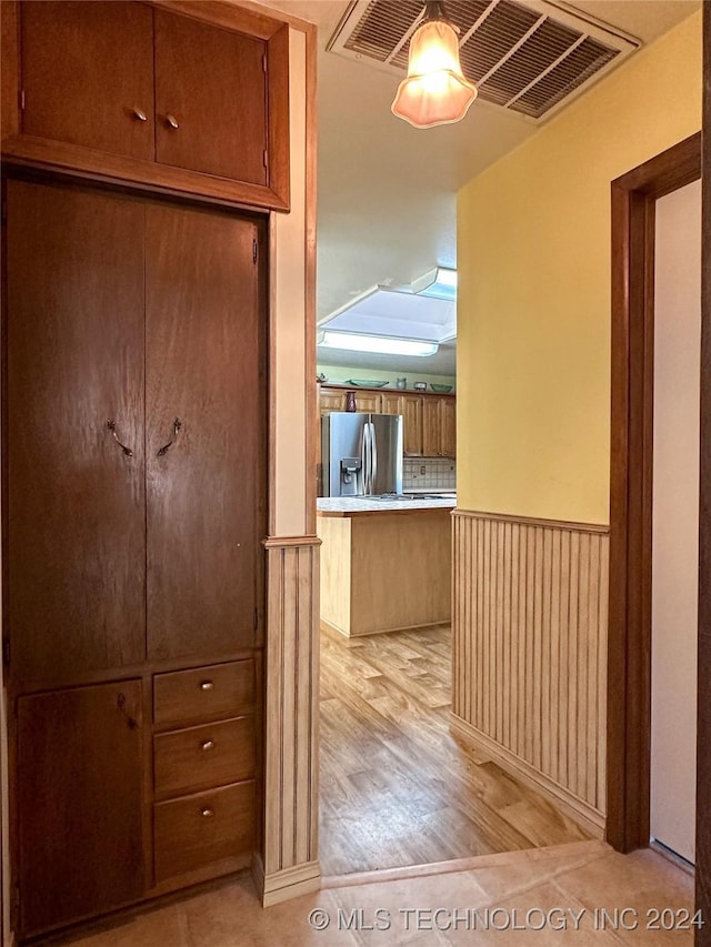 hall featuring light wood-type flooring