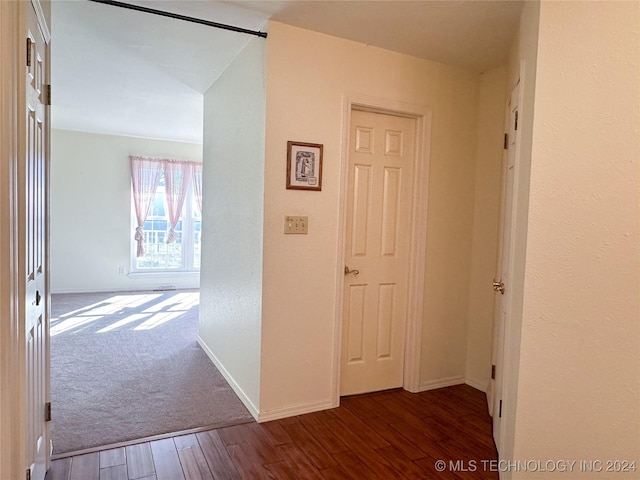 corridor featuring hardwood / wood-style flooring