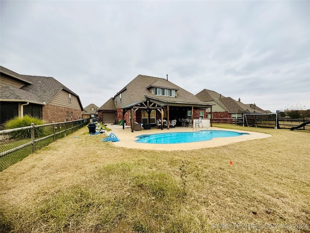 view of pool featuring a gazebo, a yard, and a patio