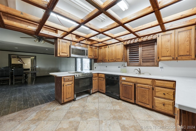 kitchen featuring ceiling fan, sink, coffered ceiling, kitchen peninsula, and black appliances