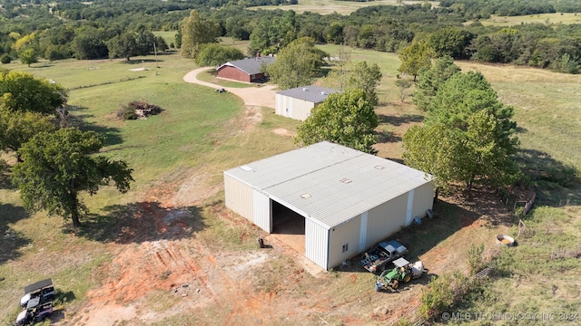 birds eye view of property featuring a rural view