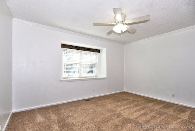 unfurnished room with carpet, ceiling fan, ornamental molding, and a textured ceiling