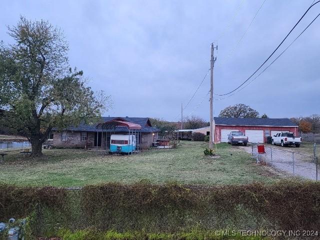 view of yard featuring a garage