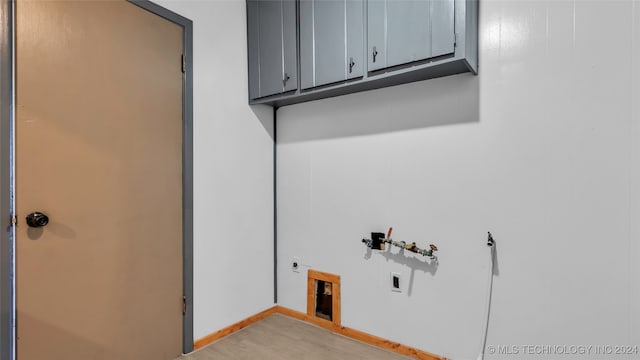 washroom featuring cabinets