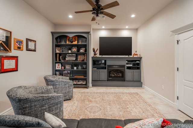 tiled living room with ceiling fan