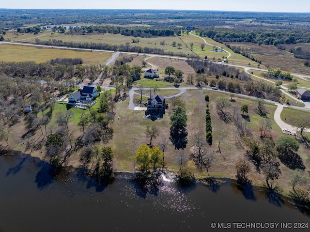 birds eye view of property featuring a rural view and a water view