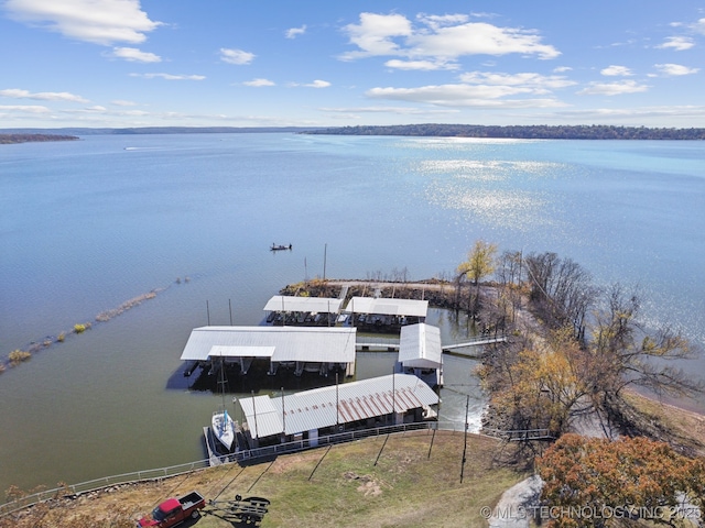 birds eye view of property featuring a water view