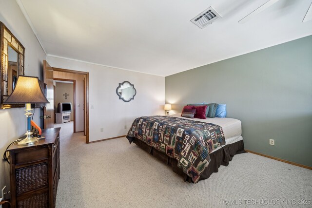 bedroom with light colored carpet