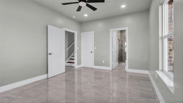 684 Chateau Bnd, Ardmore, OK 73401 - unfurnished room with marble tiled floors, a ceiling fan, plenty of natural light, and recessed lighting