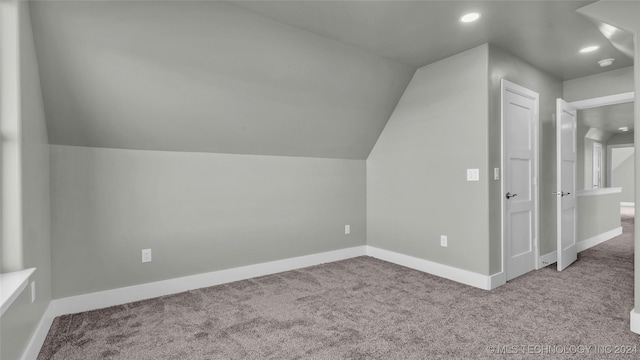 684 Chateau Bnd, Ardmore, OK 73401 - bonus room with carpet, lofted ceiling, and recessed lighting