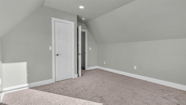 684 Chateau Bnd, Ardmore, OK 73401 - bonus room featuring carpet flooring, lofted ceiling, and recessed lighting