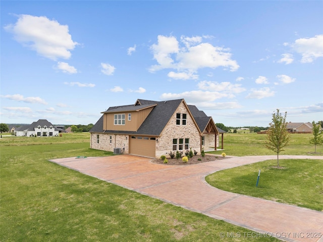 684 Chateau Bnd, Ardmore, OK 73401 - view of front of property featuring concrete driveway, stone siding, a front lawn, and board and batten siding