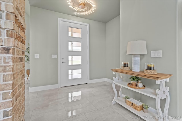 684 Chateau Bnd, Ardmore, OK 73401 - foyer entrance featuring baseboards and light marble finish flooring