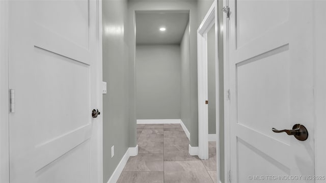 684 Chateau Bnd, Ardmore, OK 73401 - hall with baseboards and light marble finish floors