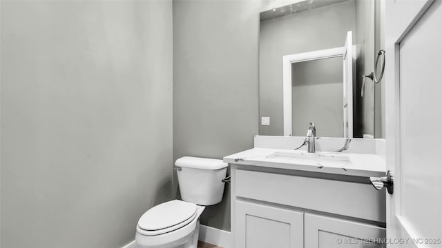 684 Chateau Bnd, Ardmore, OK 73401 - half bathroom with toilet and vanity