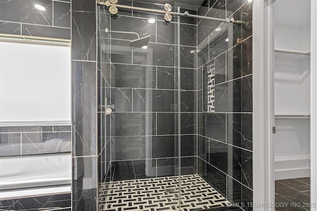 684 Chateau Bnd, Ardmore, OK 73401 - full bathroom with a stall shower and a bath