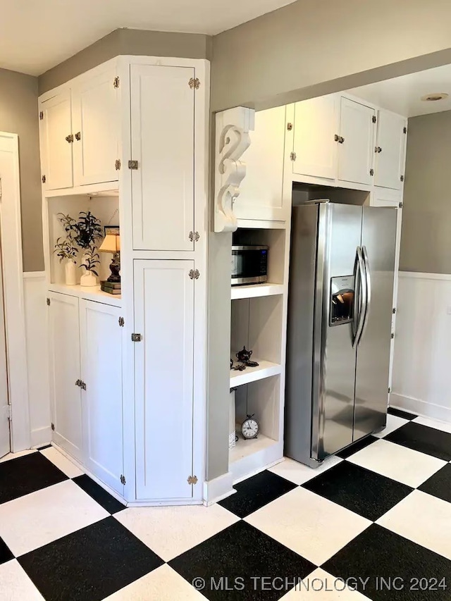 kitchen with white cabinets and stainless steel appliances